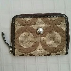 Coach emblem small zip around wallet